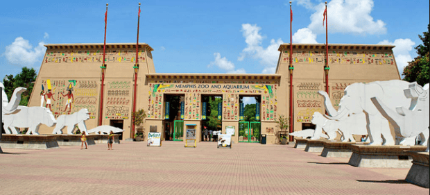 Colorful entrance of Memphis Zoo and Aquarium with Egyptian-themed architecture and animal sculptures, highlighting Memphis Heritage Inc.'s focus on preserving Memphis' cultural landmarks.